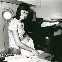 Rita Daniels, Secretary, in her office before her surgery.